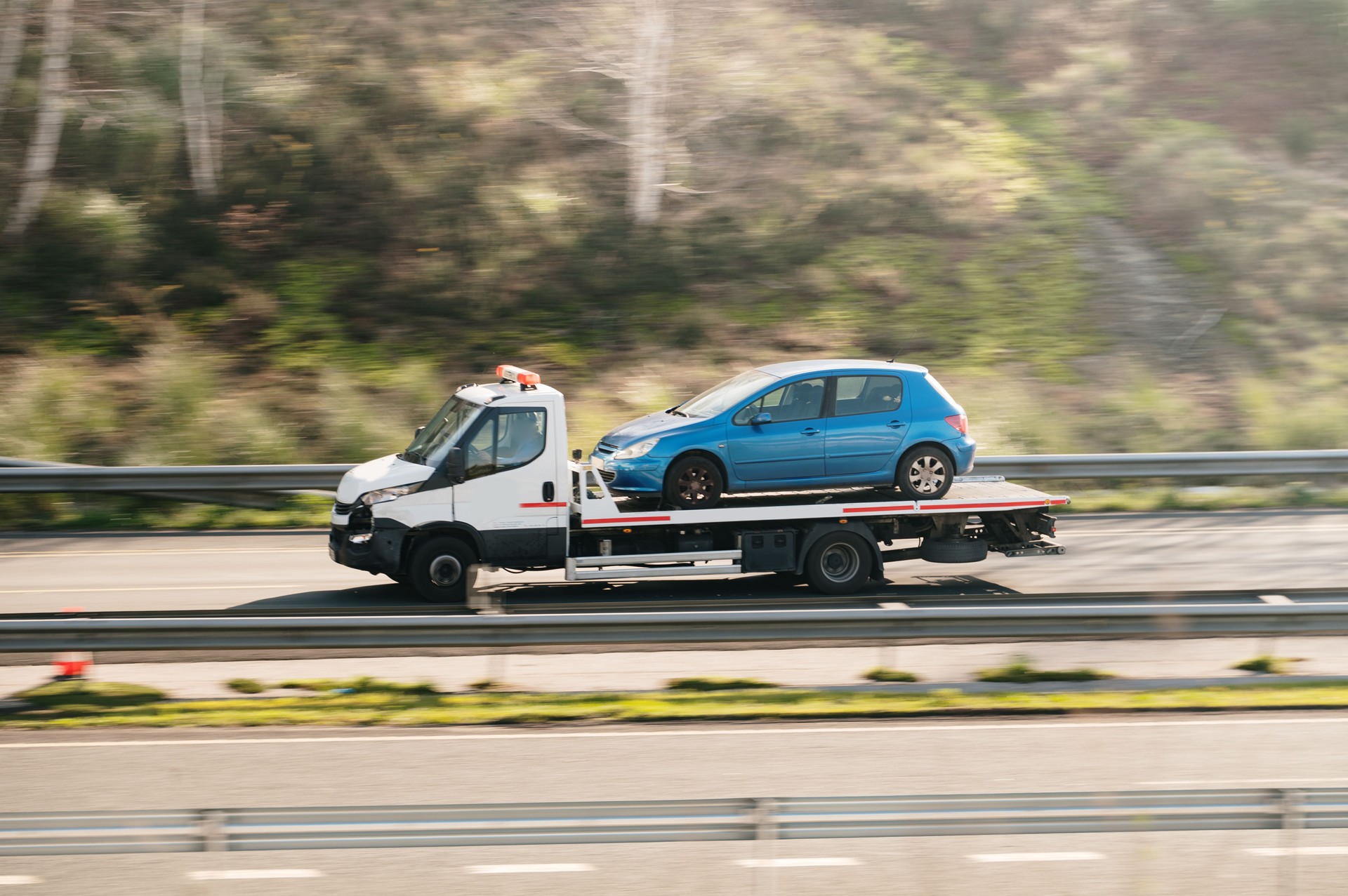Tow truck with car