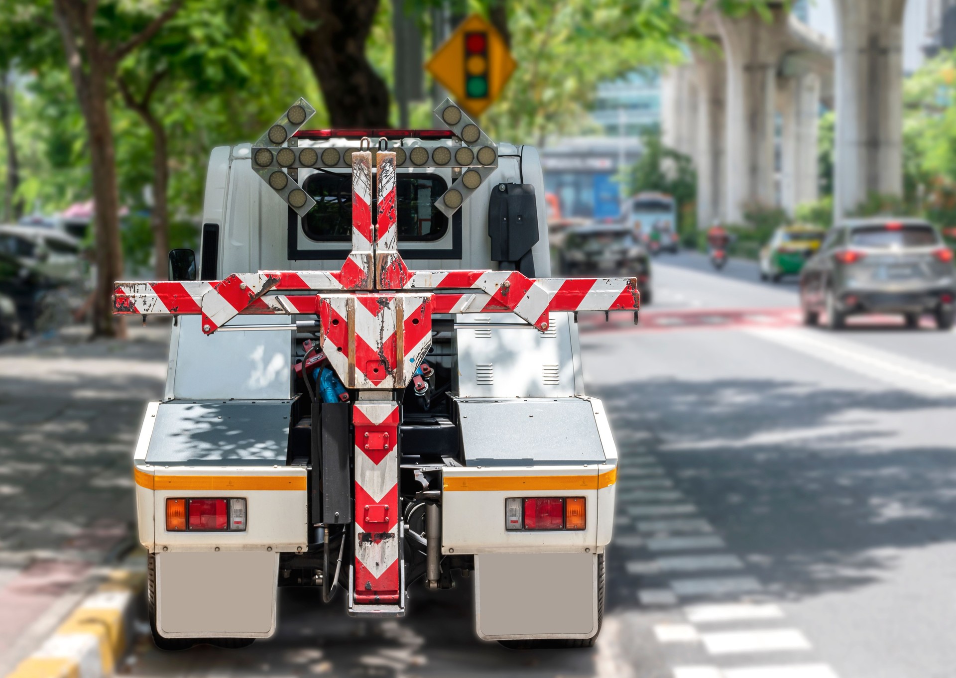 Tow truck parked on side road
